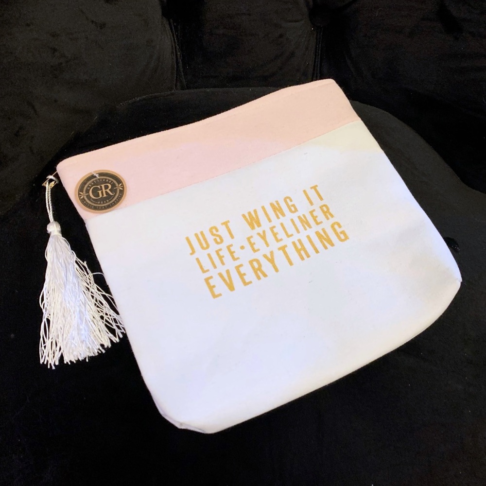 NWT make up bag - “just wing it”